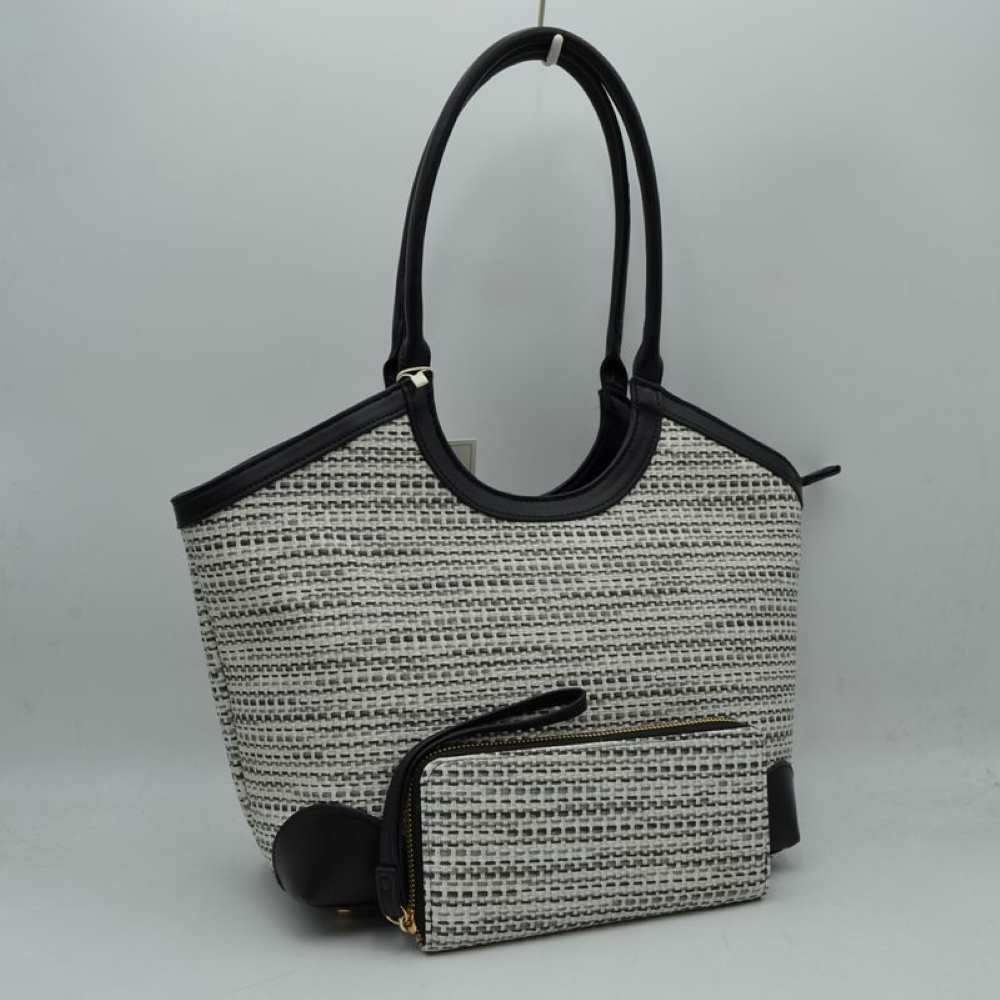 Black Infuse your daily routine with classic sophistication with this elegant two-piece handbag set, featuring a spacious shoulder tote and a matching zip-around wristlet wallet. The tote showcases a beautiful multi-tonal woven tweed pattern, sharply contrasted by clean, structured top borders and reinforced base corners that preserve its graceful shape. Designed with extra-long, arched shoulder straps that slip comfortably over your arm