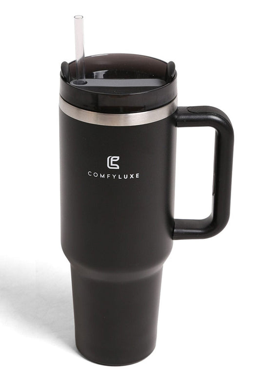Black Keep your beverages at the perfect temperature with this 40oz stainless steel tumbler. Double-wall insulation maintains hot drinks hot and cold drinks cold for hours. The ergonomic handle makes it easy to carry on the go, while the sleek solid color design works with any style. BPA-free construction ensures safe, worry-free hydration. Perfect for work, travel, or everyday use.