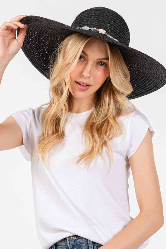 Black Embrace coastal charm with this stunning starfish-adorned sun hat, featuring a turquoise stone trim band that adds a pop of color to your beach look. Crafted from 100% paper material, this wide-brim floppy design offers excellent sun protection while keeping you cool and comfortable during outdoor adventures.