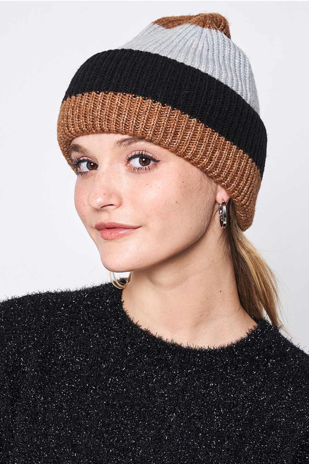 Black Stripe Color Block Ribbed Beanie features bold striped color-block detailing with a ribbed knit texture for a modern, sporty winter look. Designed with a soft stretch fit, it delivers cozy warmth and everyday comfort while adding standout style to your cold-weather outfits.