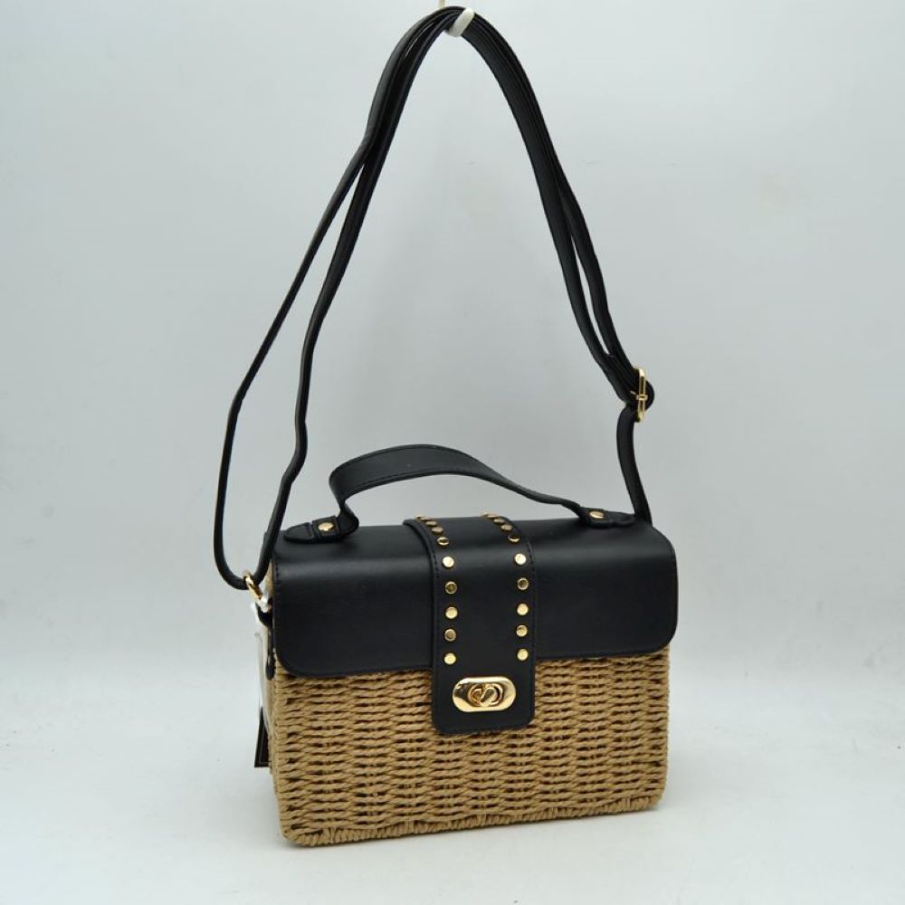 Black Embrace warm-weather sophistication with this beautiful mixed-media shoulder bag. Effortlessly blending the rustic, organic charm of a woven straw basket body with a smooth, structured faux-leather flap enclosure, this bag is a must-have accessory for casual sunny days, resort vacations, or stylish weekend brunches. Its elegant silhouette offers a refined twist on classic beachwear aesthetics, transitioning perfectly from a day in the sun to an evening out.