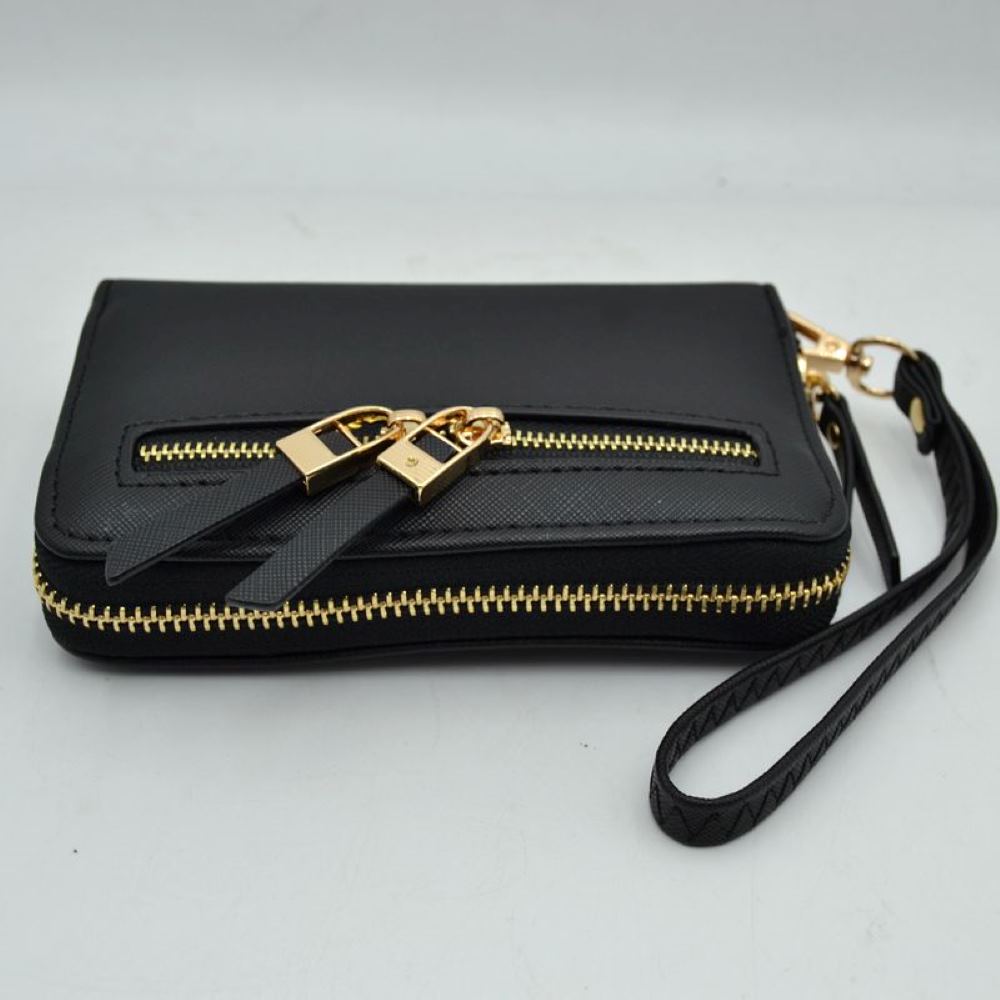 Black This practical everyday wallet clutch features a structured rectangular design equipped with multiple storage compartments to keep your essentials organized. It includes a secure main wrap-around zipper closure alongside a distinct dual-zipper front accent pocket featuring metallic pulls with extended tabs. Designed for effortless hands-free carrying, it comes with a detachable, textured wristlet strap connected by a metallic clasp, combining convenience and contemporary style for daily use.