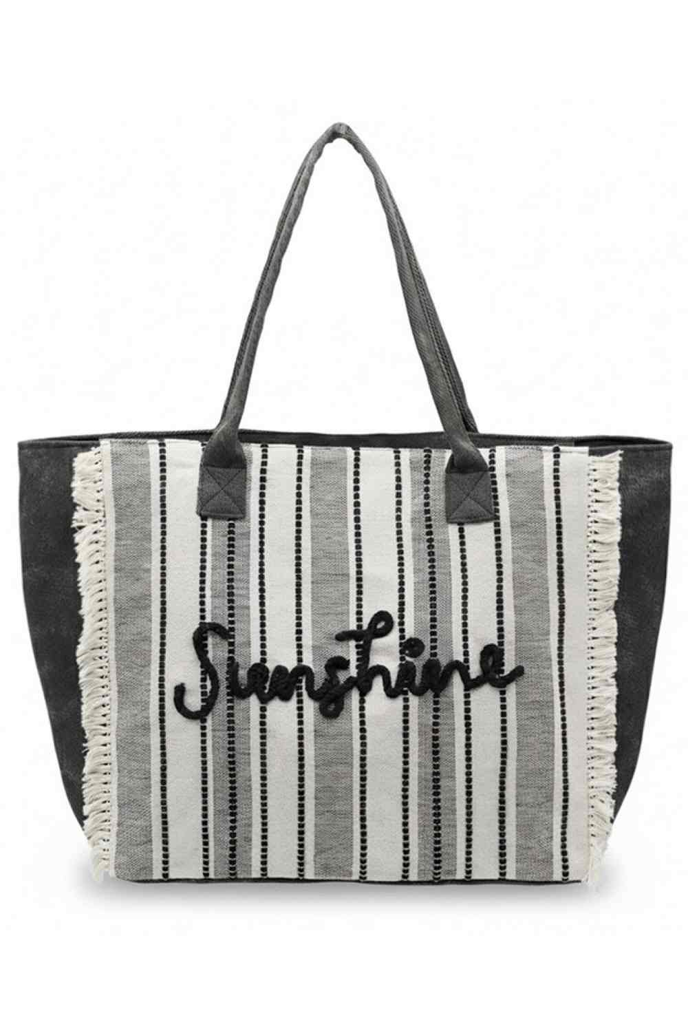 Black Carry your essentials in retro style with this vintage-inspired tote bag. Featuring a bold "SUNSHINE" letter design paired with classic stripes and playful fringe detailing, it's the perfect accessory for beach days, shopping trips, or everyday adventures. Crafted from durable 100% polyester, this spacious bag measures 21.5" x 14" x 6" and includes a secure zipper closure and convenient inner pocket for organized storage. A fun, functional piece that brings nostalgic charm to your wardrobe.