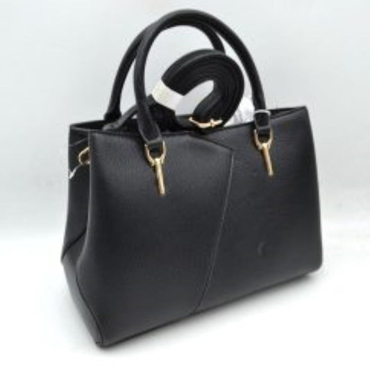 Black This structured tote bag features a finely textured exterior surface and a distinct asymmetric overlapping seam design across the front panel, offering a refined look for everyday use. It is styled with dual sturdy top handles attached via elongated polished hardware anchors. The spacious main storage compartment features a wide top opening, while a bundled adjustable, detachable shoulder strap is included for versatile hands-free carrying options.
