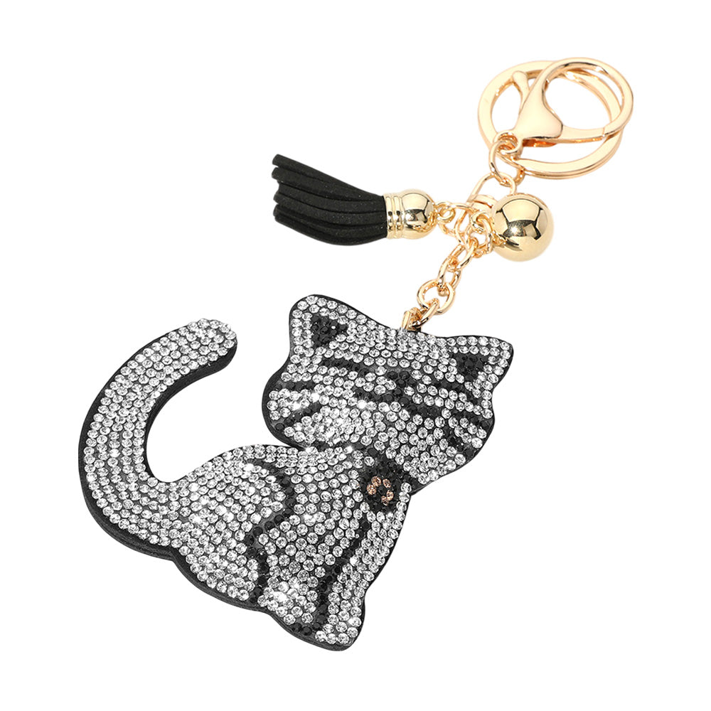 Black Bling Studded Cat Tassel Bag Charms are a must-have for any fashion-forward individual. Featuring a stunning cat design with intricate studded detailing, these charms will add a touch of elegance and personality to any bag. The tassel adds a playful yet sophisticated touch, making these bag charms a statement piece for any outfit. 