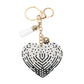 Black Bling Heart Tassel Bag Charm is a stylish and eye-catching accessory that will add a touch of sparkle to any bag. With its bling heart design and tassel detail, it is perfect for the fashion-forward individual. Made with high-quality materials, it is both durable and fashionable.