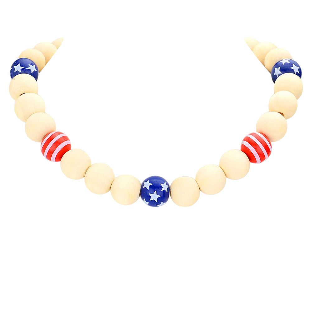 Blue Red American USA Flag Wood Ball Collar Necklace combines patriotic symbolism with artisanal craftsmanship. The spherical wooden pendant features a meticulously painted American flag design, suspended from a comfortable collar-style chain. The natural wood grain creates a unique backdrop for the iconic stars and stripes, offering a sophisticated way to display national pride. Precision-crafted for durability and aesthetic appeal, this statement piece complements both casual and formal attire.