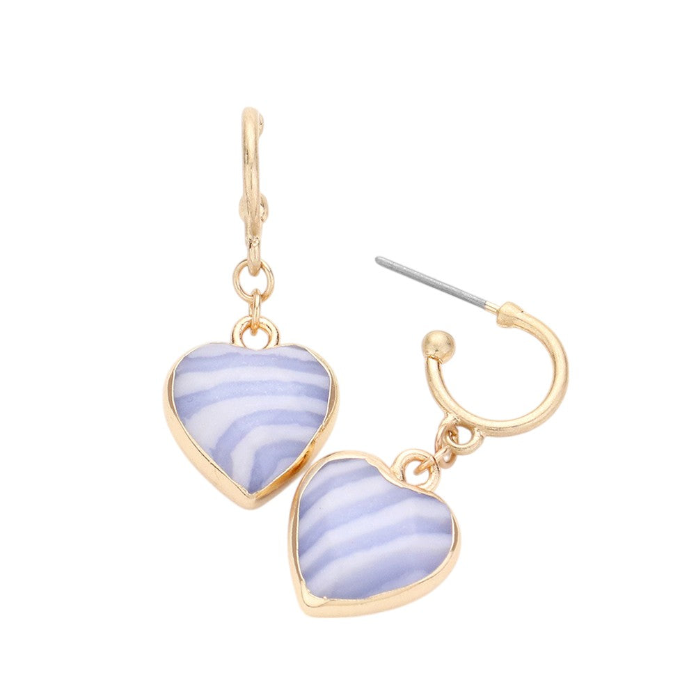 Blue Semi-Precious Natural Stone Heart Dangle Earrings offer an elegant touch to any outfit. Made with genuine semi-precious stones, each earring features a heart-shaped dangle for a unique and eye-catching look. Add these to your jewelry collection for a touch of natural beauty.
