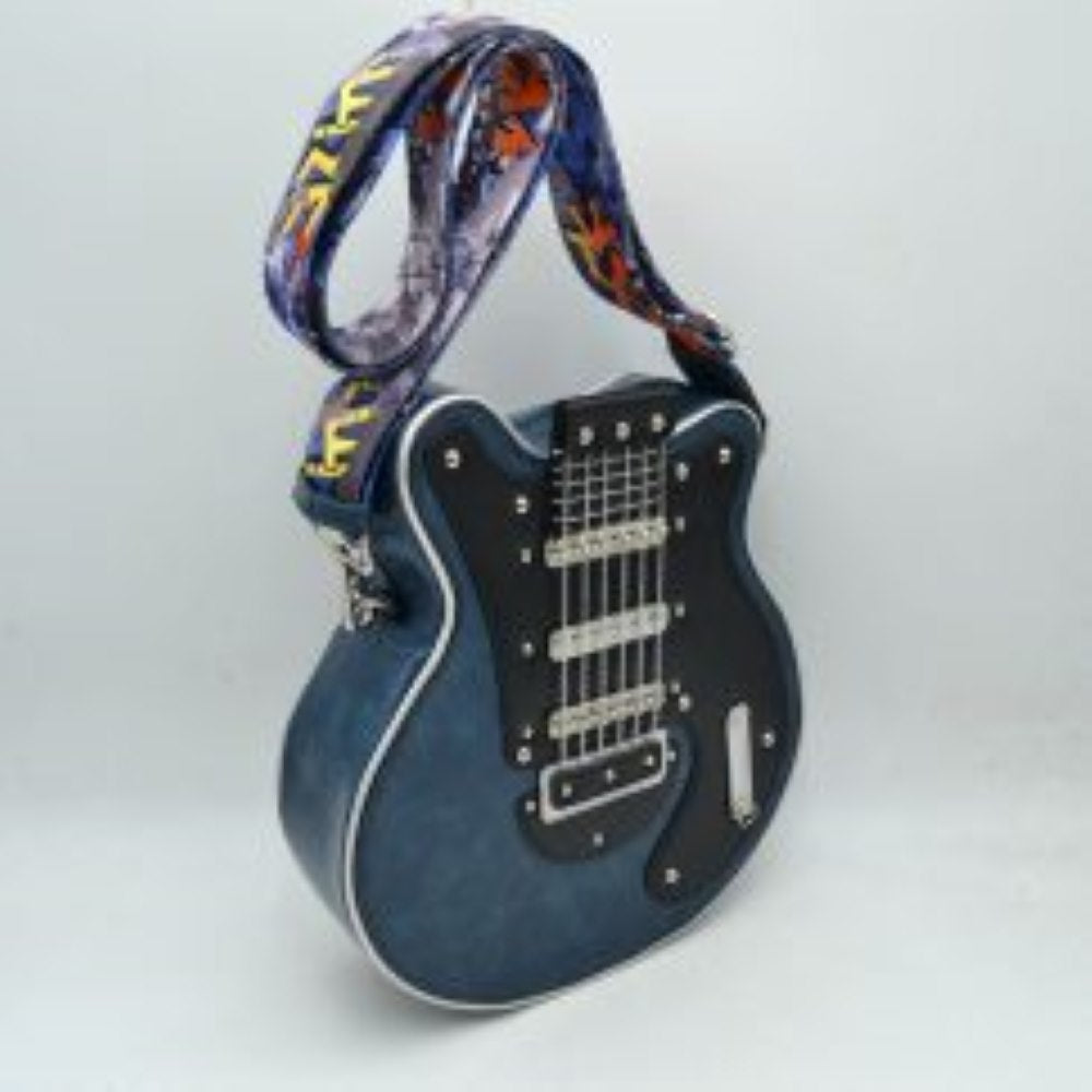 Blue This unique novelty handbag features a structured silhouette designed to look like an electric guitar, making it an exceptional statement piece for music lovers. The prominent front panel showcases a color-blocked black and off-white design detailed with polished metallic studs, faux pickups, and delicate hanging chain links that mimic classic guitar strings. Equipped with a secure top zipper closure to keep your essentials safe