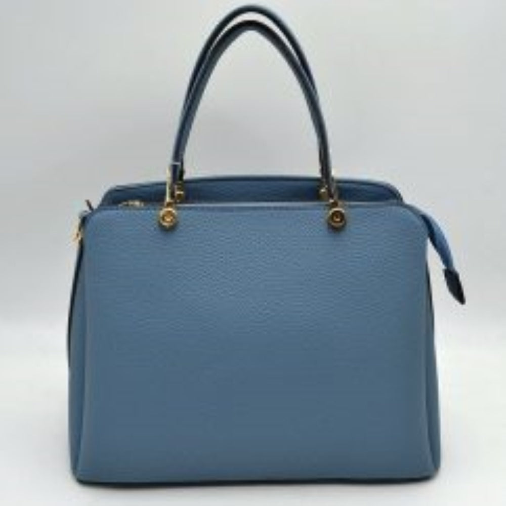 Blue This structured handbag is designed for everyday use, featuring dual arched top handles attached with round metallic hardware. The design includes multiple storage compartments to organize your belongings, featuring a central zippered closure alongside separate side compartments.