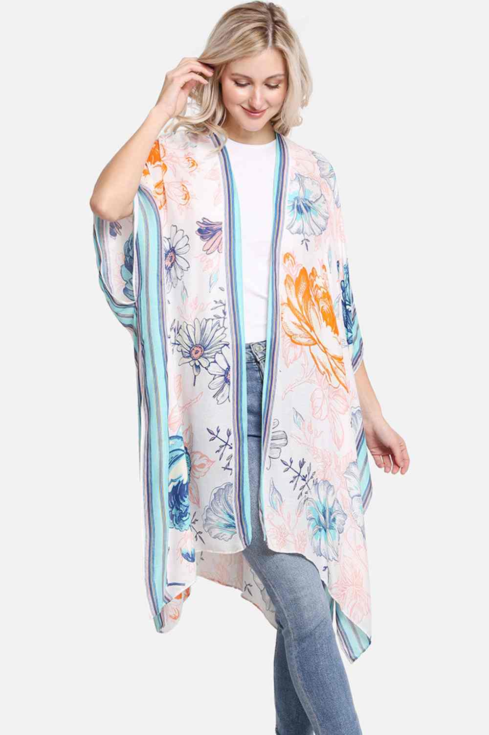 Blue Embrace effortless summer style with this lightweight floral kimono cover-up. Featuring a beautiful floral print accented by striped edges, it's the perfect layering piece for beach days, poolside lounging, or casual outings. Crafted from breathable 100% viscose, this cover-up drapes beautifully and moves with you. Generously sized at 38" x 39", it offers comfortable coverage without restriction. Ideal for throwing over swimwear or pairing with summer dresses for an instantly polished look.