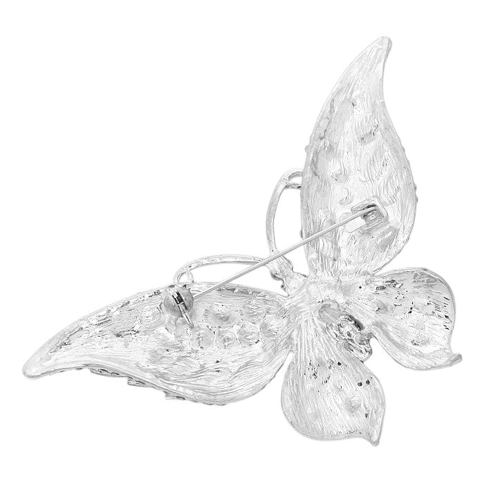 Blue Glass Crystal Butterfly Pin Brooch is expertly crafted with sparkling glass crystals, adding a touch of elegance and sophistication to any outfit. With its timeless butterfly design, this tasteful accessory is perfect for any occasion. Enhance your ensemble with a touch of shimmer and charm.