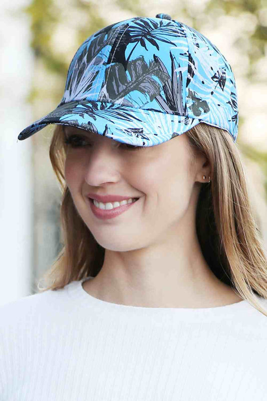 Blue The Leaves Print Baseball Cap features a stylish all-over leaf pattern that adds a fresh, nature-inspired touch to any casual outfit. Made from lightweight, breathable fabric with an adjustable strap, it offers comfortable all-day wear and a secure fit.