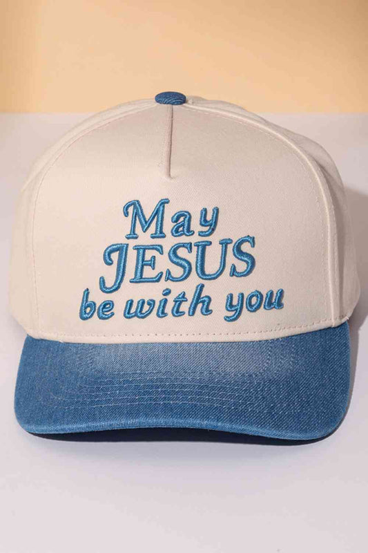 Blue Classic two-tone trucker cap featuring an embroidered "MAY JESUS BE WITH YOU" message across the front. Crafted from 100% cotton for breathability and comfort, this snapback design offers one-size-fits-most versatility. Perfect for everyday wear, outdoor activities, or expressing your faith. The structured six-panel construction and mesh back panels provide durability and ventilation. An ideal accessory for those seeking meaningful style with spiritual significance.