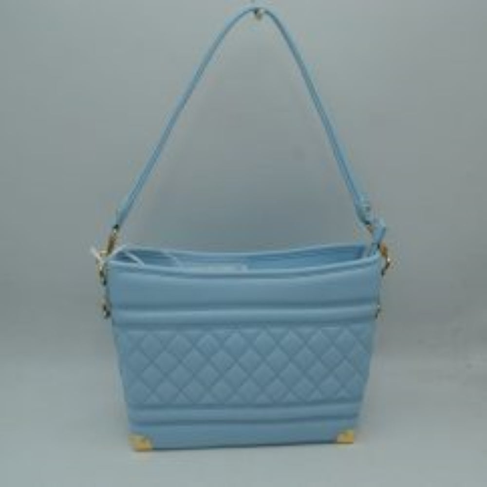 Blue This everyday shoulder bag features a structured silhouette highlighted by a quilted diamond pattern across the lower midsection and horizontal stitched ridges. Designed for practical daily use, it is equipped with a single flat shoulder strap secured to the sides by hardware attachments.