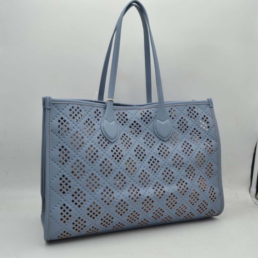 Blue Elevate your accessory game with this stunning black perforated tote. Combining architectural precision with everyday practicality, this bag features an intricate laser-cut lattice design that offers a modern, airy feel while maintaining a structured, high-end silhouette. Whether you're heading to a business meeting or a weekend brunch, this versatile tote is the perfect blend of edgy detail and classic sophistication.