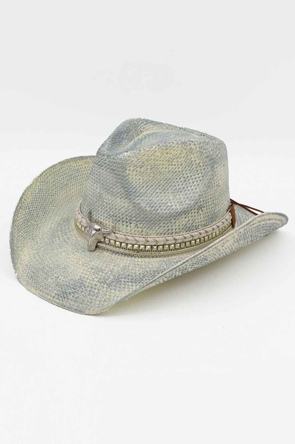 Blue Embrace authentic Western style with this handmade vintage cowboy hat, featuring a striking silver bull head emblem and multi-band design. Crafted from 100% paper, this lightweight hat delivers classic cowgirl charm with a modern edge. Perfect for rodeos, festivals, or everyday wear, it captures the spirit of the Old West while remaining comfortable and breathable. A timeless accessory that stands out from the crowd.
