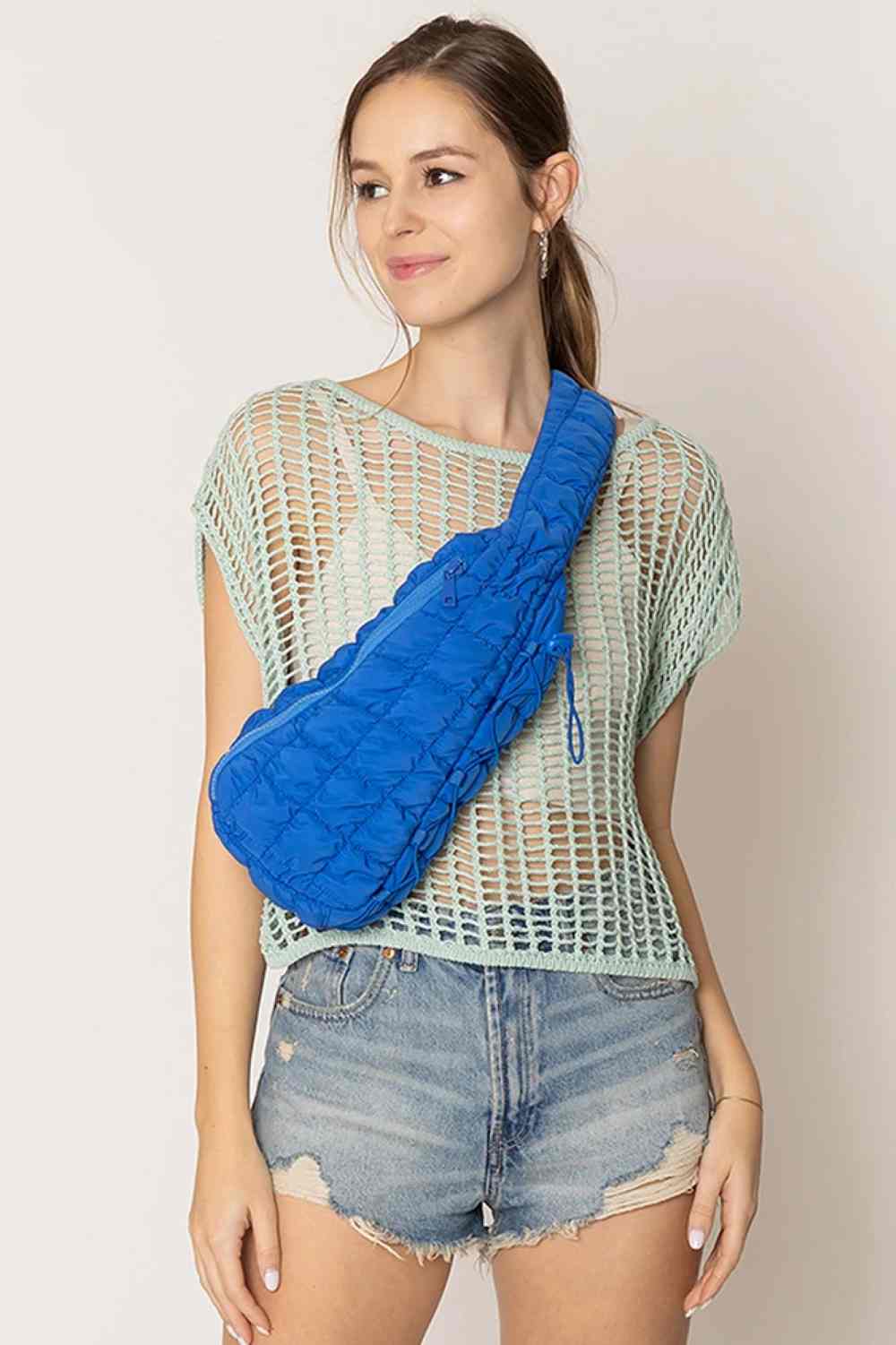 Blue Carry your essentials in style with this Solid Quilted Sling Bag. Crafted from durable 100% polyester with a classic quilted design, it offers a sleek, versatile look that complements any outfit. The adjustable sling strap allows for comfortable crossbody wear, making it perfect for everyday errands, travel, or casual outings. One size fits all.