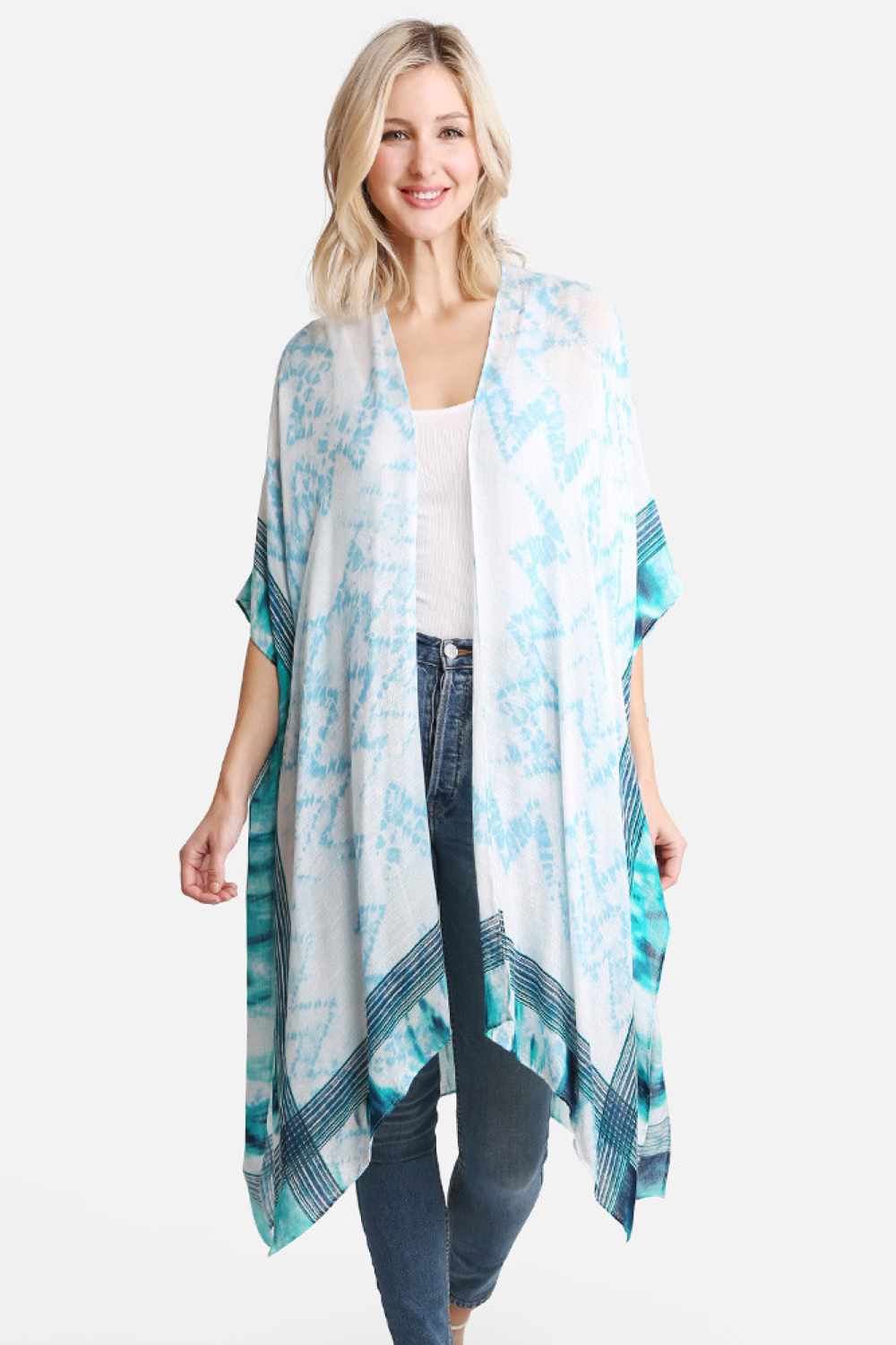 Blue Effortless summer style meets vibrant artistry with this tie dye zigzag pattern cover up. Crafted from 100% viscose, the lightweight fabric drapes beautifully over swimwear or casual outfits, offering breathable comfort on warm days. The eye-catching zigzag print in rich tie dye hues adds a playful, bohemian touch to any beach or resort look. Dimensions: 38" x 39" Material: 100% Viscose Origin: Made in China Perfect for layering over your favorite swimsuit or wearing as a standalone piece for an effort