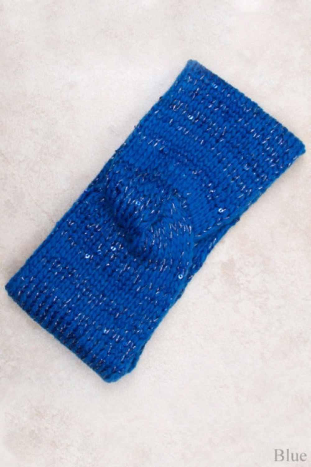 Blue Elevate your winter style with this charming two-color knit paired with a sparkling spangle headband. The soft, cozy knit features a classic color-block design, while the embellished headband adds a touch of glamour and personality. Perfect for staying warm without sacrificing style, this coordinated set brings effortless sophistication to any cold-weather look. Whether you're heading out for a casual day or a special occasion, this combination delivers comfort and eye-catching appeal.