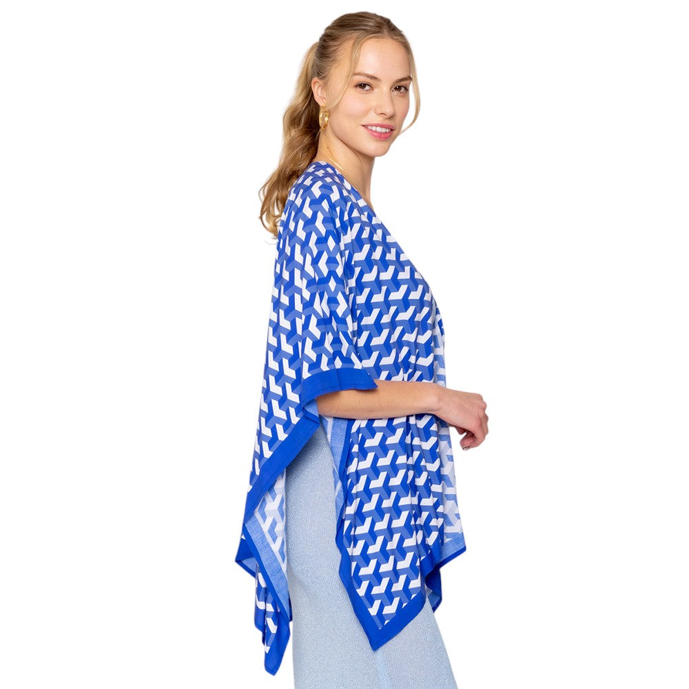Blue Geometric Pattern Print Ruana Poncho is a must-have addition to your wardrobe. Crafted with a unique geometric pattern, this poncho adds a touch of modern style to any outfit. Made with high-quality materials, it provides both comfort and durability. Perfect for any occasion, this versatile piece is a statement piece you won't miss out on. 