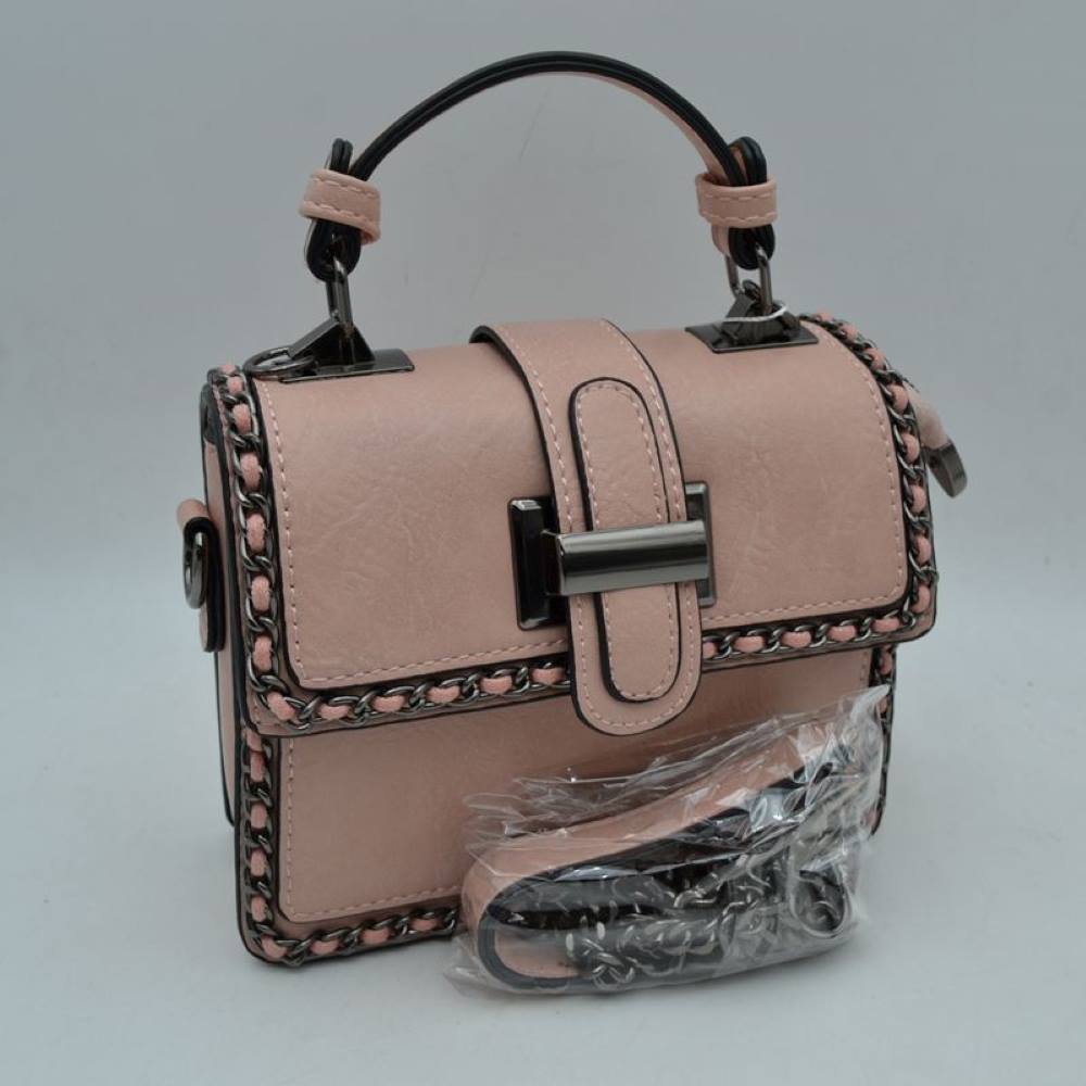 Blush Add a touch of structured elegance to your look with this chic top-handle satchel bag. Designed for the modern trendsetter, it seamlessly blends classic vintage vibes with contemporary edgy accents.