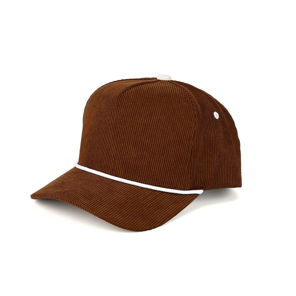 Brown Add timeless texture to your outfit with the C.C Solid Corduroy Snapback Trucker Cap, featuring a classic corduroy design and decorative rope detail for subtle style. Designed with an adjustable snapback closure and breathable mesh back, it offers a comfortable, customizable fit for everyday wear.