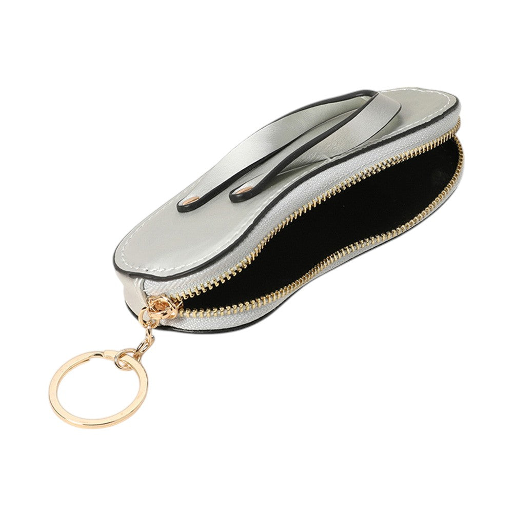 Brown Faux Leather Flip-flop Mini Wristlet Bag Charm Coin Purse offers a convenient and stylish way to carry your essentials. Made from durable faux leather, this mini wristlet bag doubles as a charm for your larger bag. Keep your coins, keys, or credit cards easily accessible with this sleek and functional accessory.