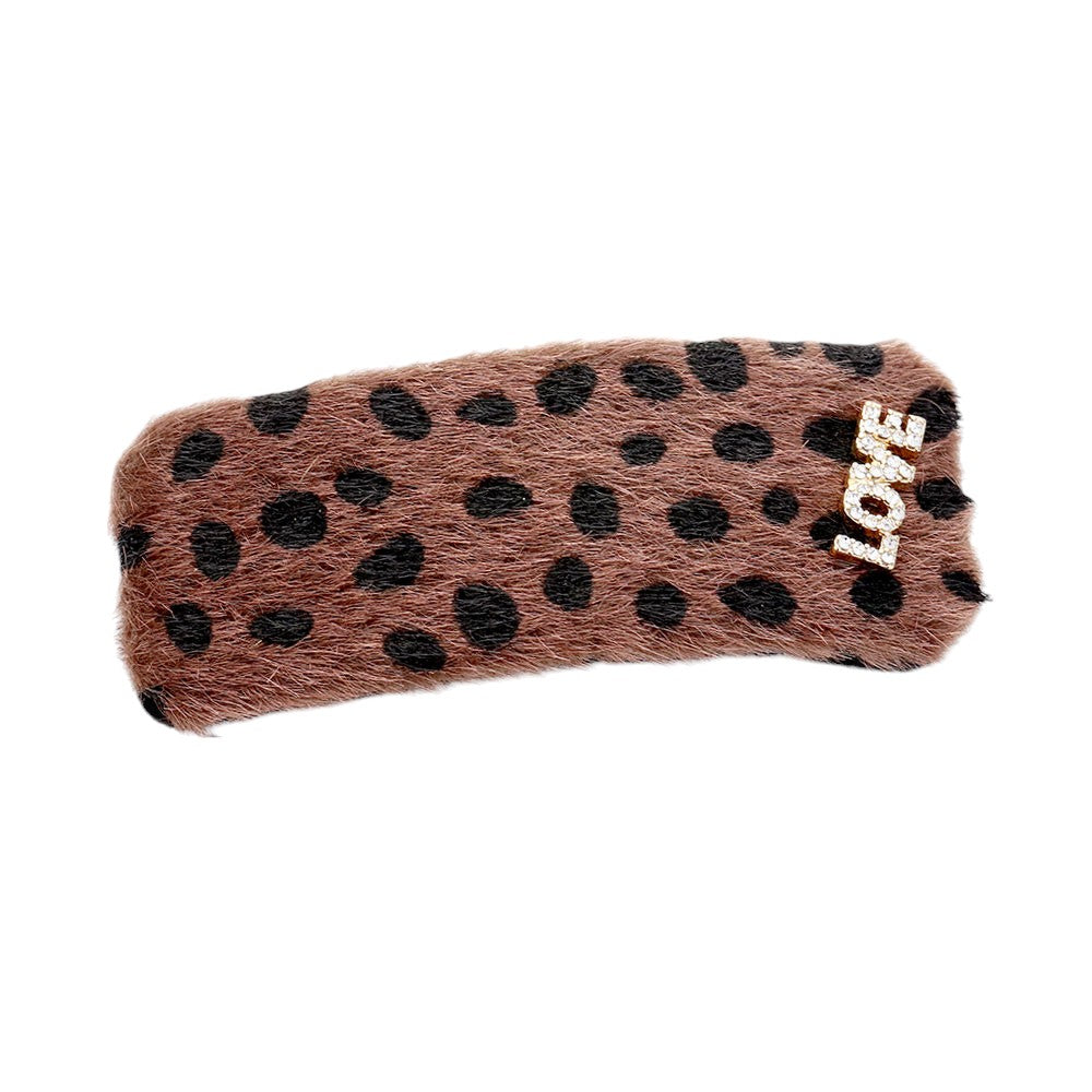 Brown Gold Leopard Faux Fur Love Barrette adds a touch of wild style to any outfit. Made with high-quality faux fur, this barrette is both stylish and comfortable to wear. Its unique design is perfect for those looking to make a statement and stand out from the crowd.