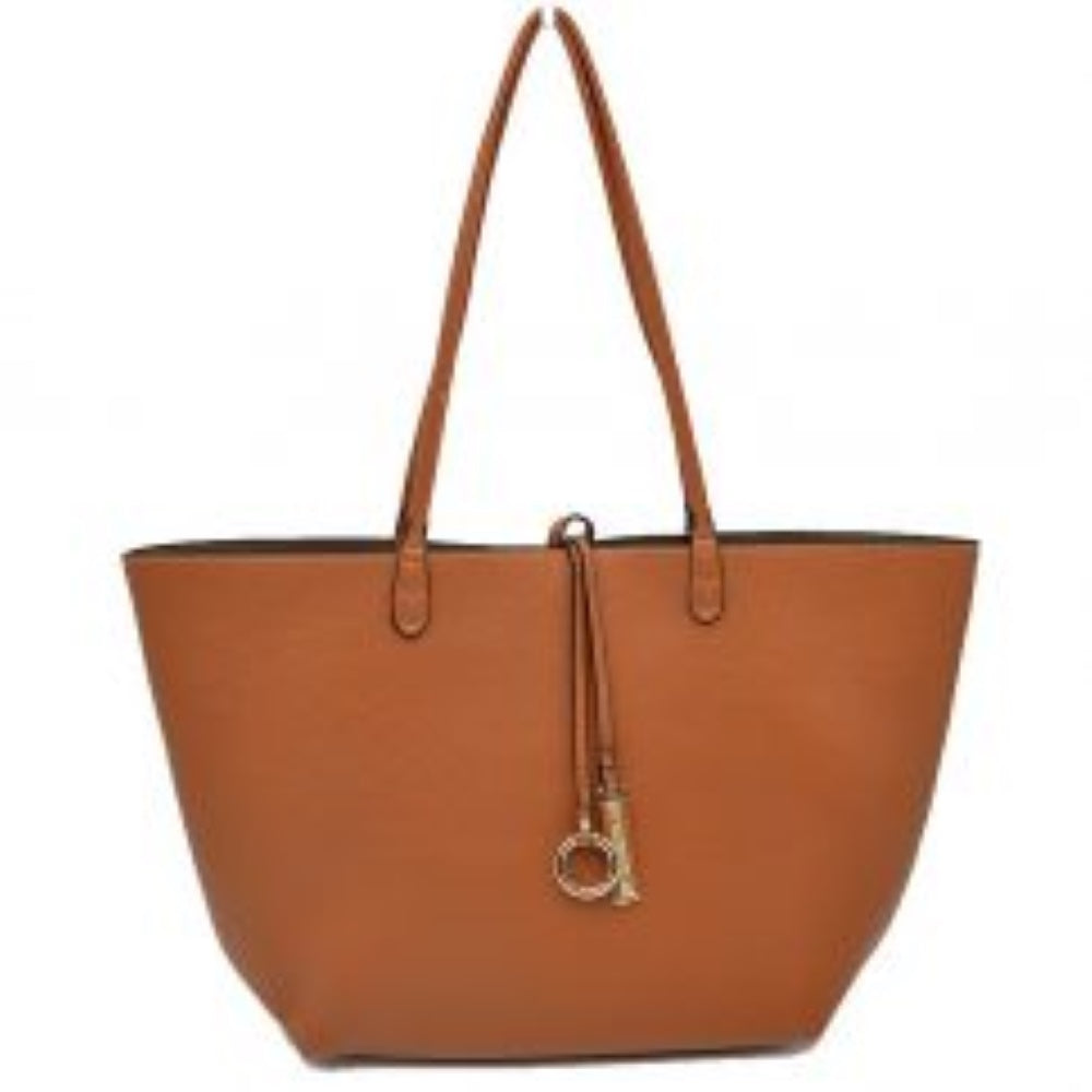 Brown-Gray This classic tote bag features a smooth exterior finish with a timeless trapeze silhouette, offering an elegant look for everyday use. Designed with an open top for quick access, the spacious main compartment provides ample storage space for daily essentials. Dual slim shoulder handles are securely stitched to the upper panels, while a decorative central drawstring tie accents the front, complete with a metallic ring and matching tab accent for a polished touch.