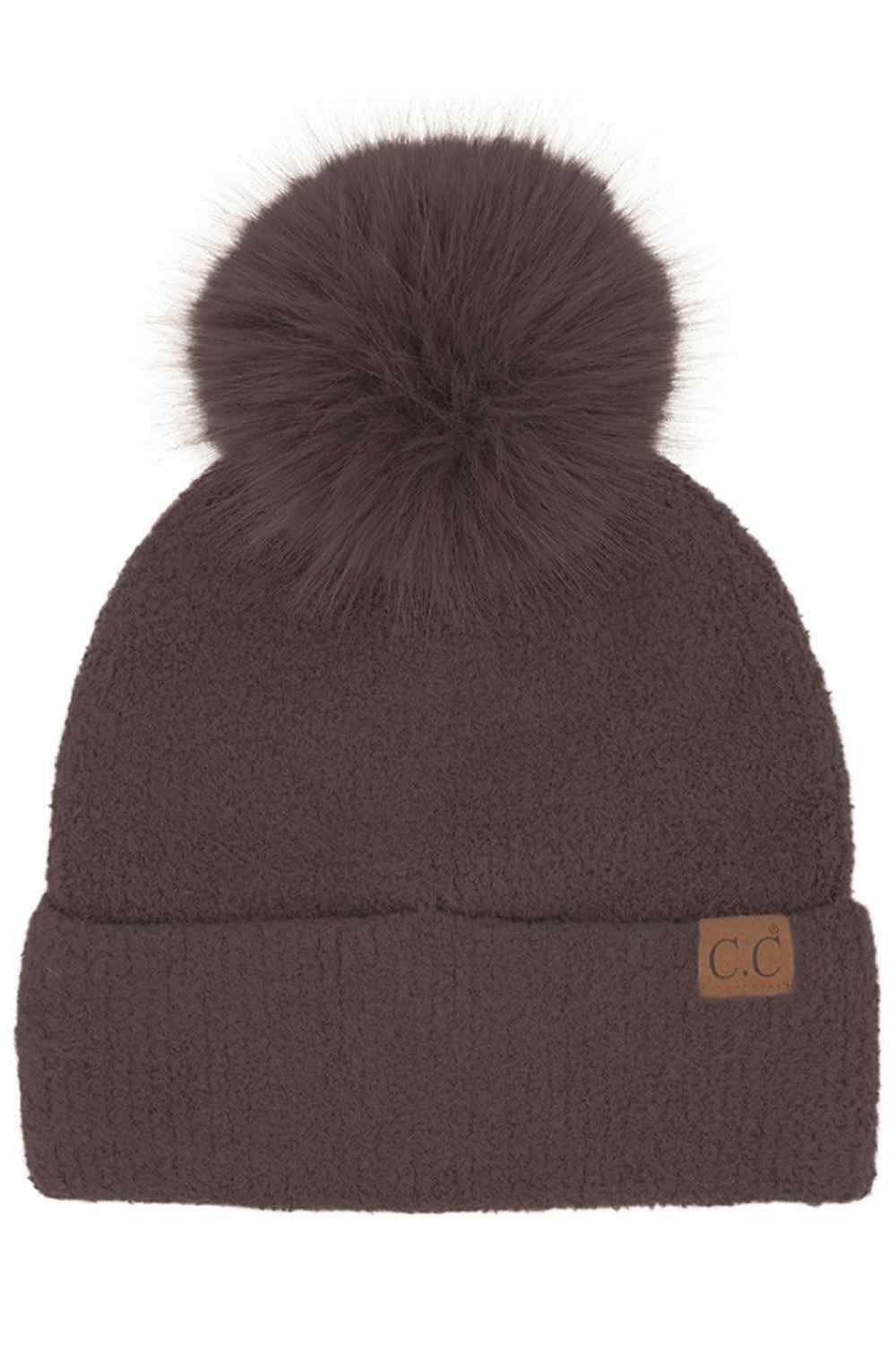 Brown C.C Plush Terry Chenille Pom Beanie Winter Hat&nbsp;combines superior thermal protection with refined style. Constructed from premium terry chenille fabric, this hat delivers exceptional insulation while maintaining breathability. The distinctive pom accent adds visual interest without compromising functionality. Designed with precise dimensions to ensure optimal coverage of ears and forehead, this cold-weather essential maintains its structural integrity throughout extended wear.