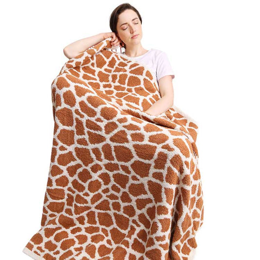 Brown Reversible Giraffe Patterned Throw Blanket, Featuring a reversible design of beautiful giraffe patterns, this throw blanket will instantly add a pop of color to any room. Winters will be kept cozy with the microfiber material that ensures warmth without sacrificing comfort. This can be a nice gift in the cold ace.