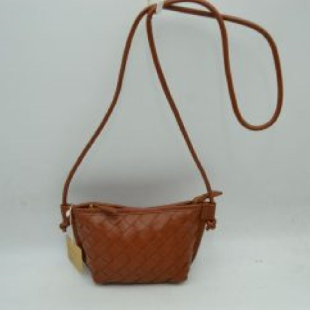 Brown This small crossbody bag features a distinct woven texture across the main body, providing visual interest. A slim, round cord strap, attached with unique knot details, enables comfortable everyday wear. The compact design secures with a top zipper closure, complete with a practical zipper pull, keeping essentials safe and easily accessible within the main compartment.