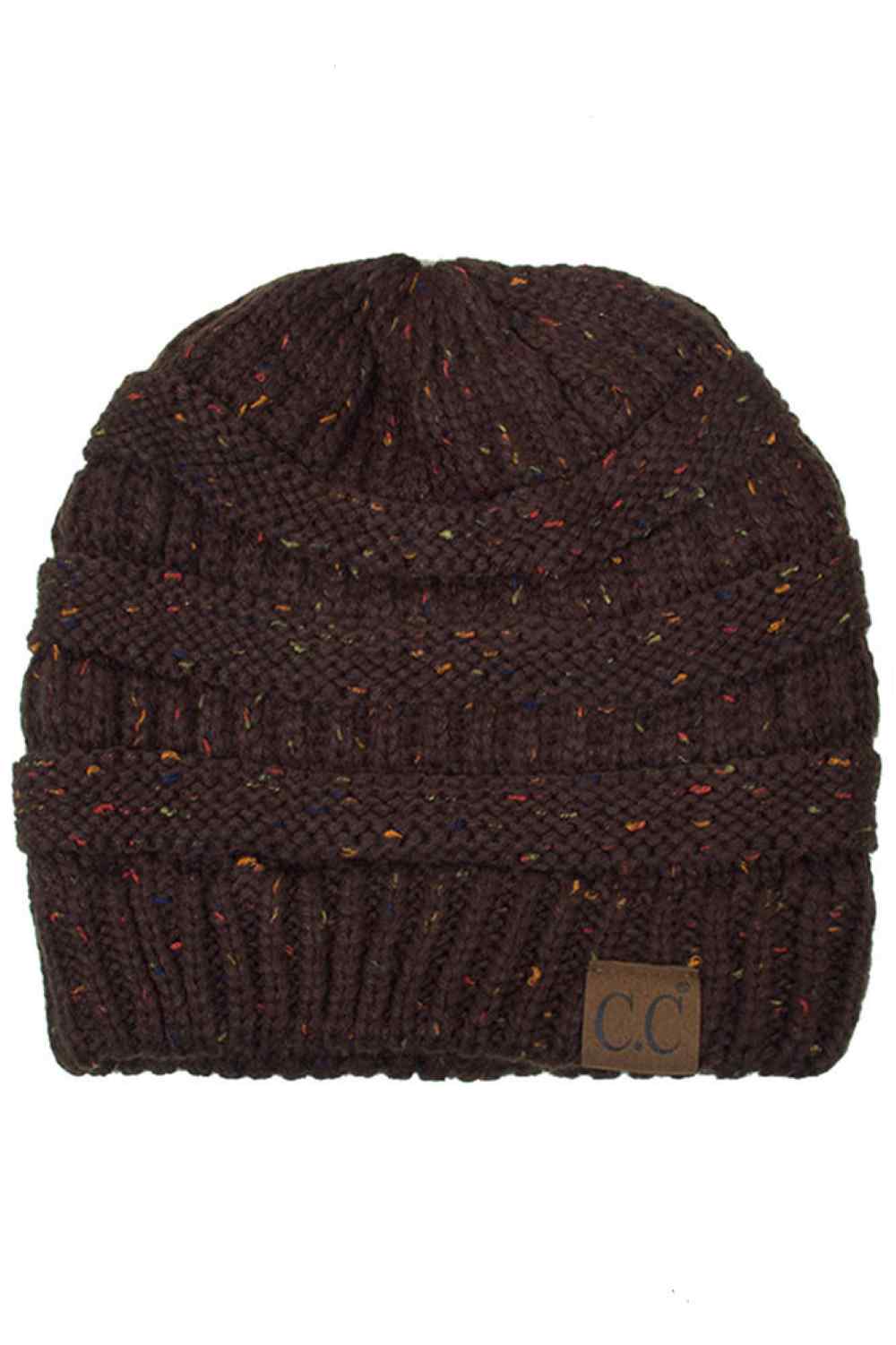 Brown Stay warm with timeless style in this C.C Confetti Cable Knit Beanie. Crafted from 100% soft acrylic, the classic cable knit texture provides excellent insulation while maintaining breathability for all-day comfort. The playful confetti detailing adds visual interest to this versatile essential. Lightweight yet durable, this beanie transitions seamlessly from casual outings to outdoor adventures, making it a reliable choice for any season.