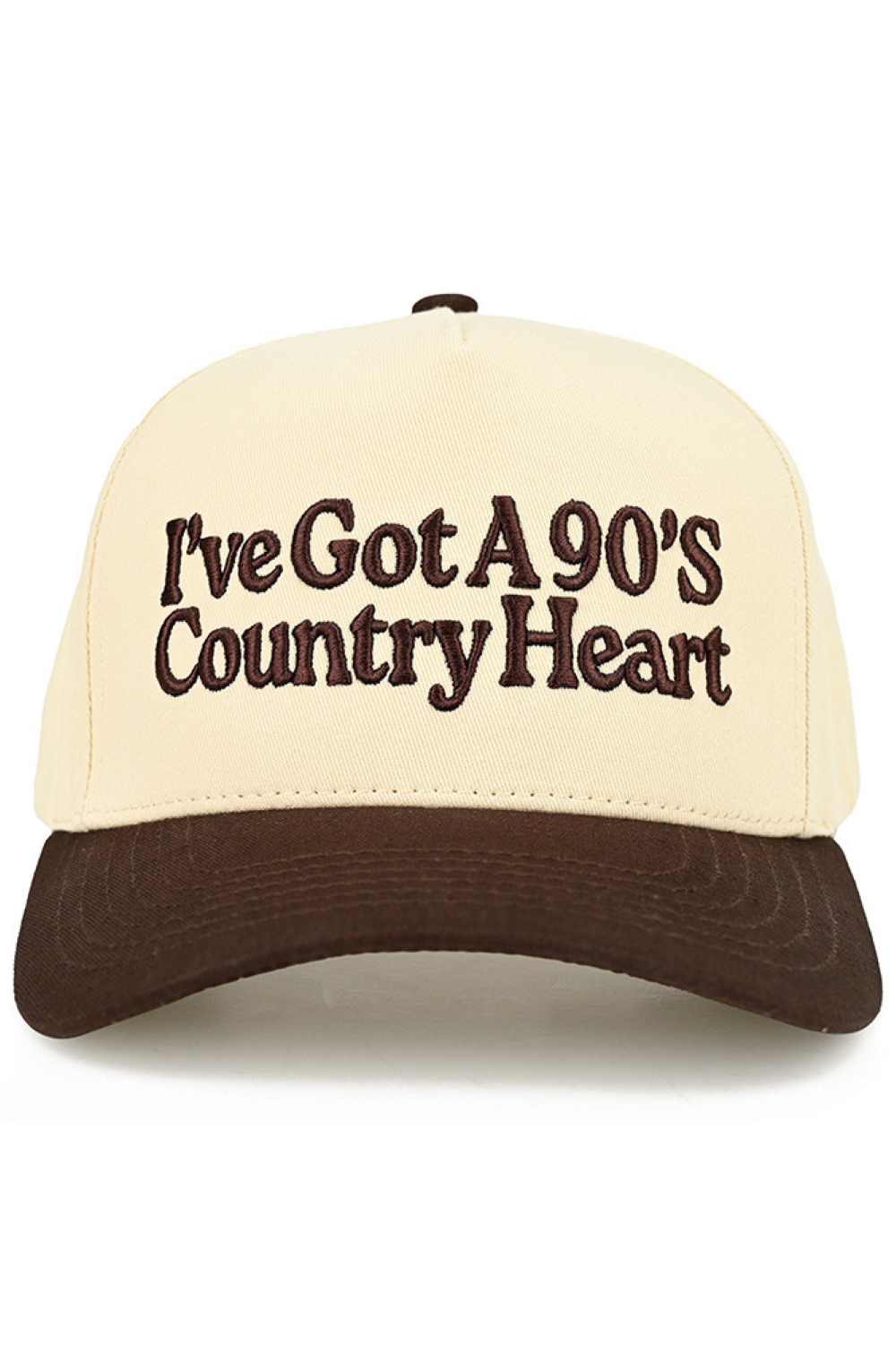 Brown Embrace your country spirit with this charming C.C trucker hat featuring an embroidered "I'VE GOT A 90'S COUNTRY HEART" design. Crafted from 100% cotton, this two-tone baseball cap delivers comfort and style for everyday wear. The adjustable snap back closure ensures a perfect fit for most head sizes, with a 22.5" circumference. Whether you're a country music fan or love vintage-inspired fashion, this hat adds authentic flair to any outfit. Made in Vietnam with quality construction that lasts.