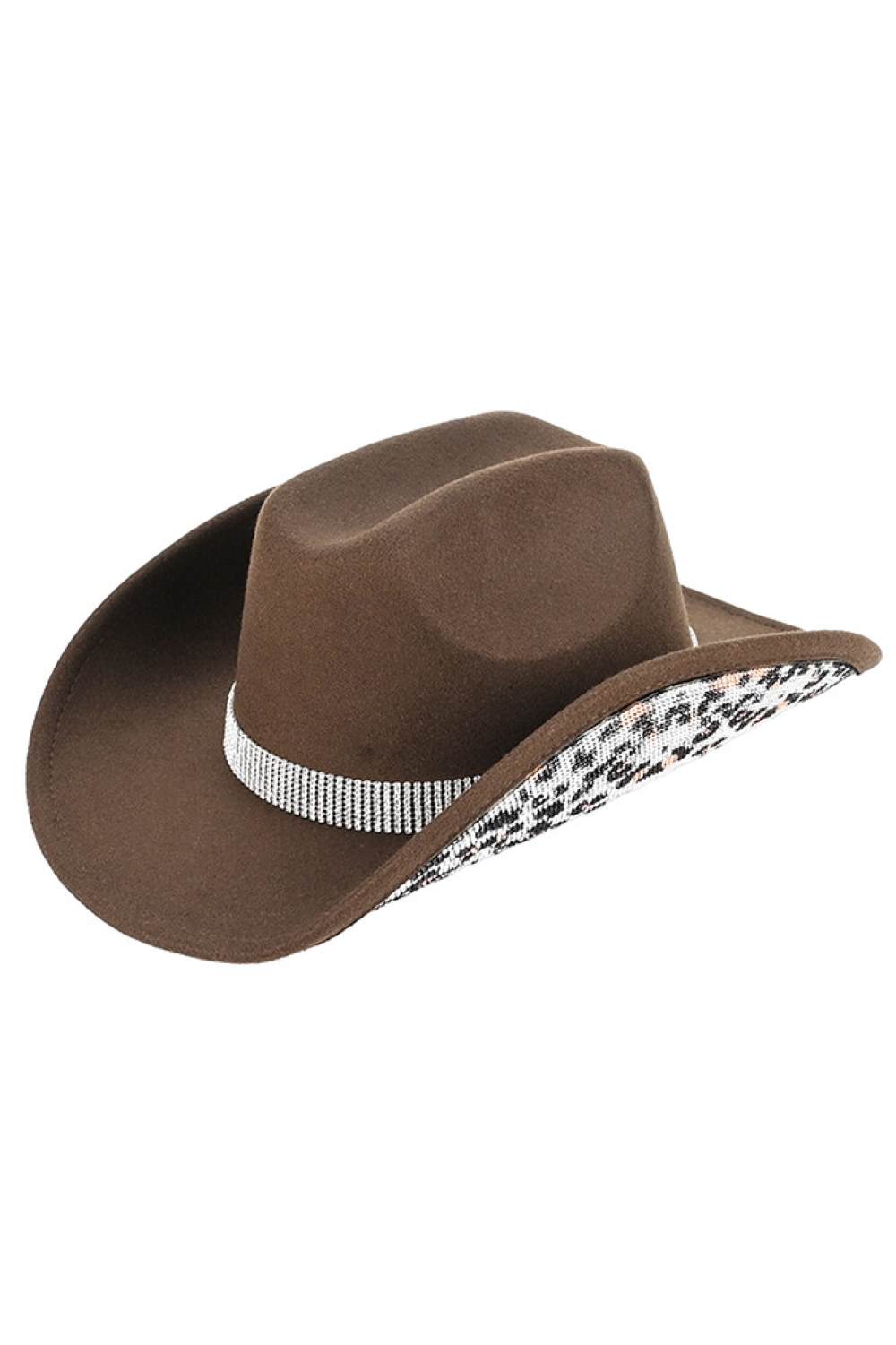 Brown Make a statement with this C.C Leopard Pattern Rhinestone Cowboy Hat, where bold animal print meets sparkling embellishment. Constructed from 100% polyester vegan felt, this hat offers a soft, suede-like texture with lasting durability. The rhinestone accents add glamorous detail perfect for Western-inspired outfits, festivals, or standout everyday style. With a 3.5" brim and 5" crown, it's designed for a comfortable fit. One size fits most with a 22.63" circumference. Made in China.