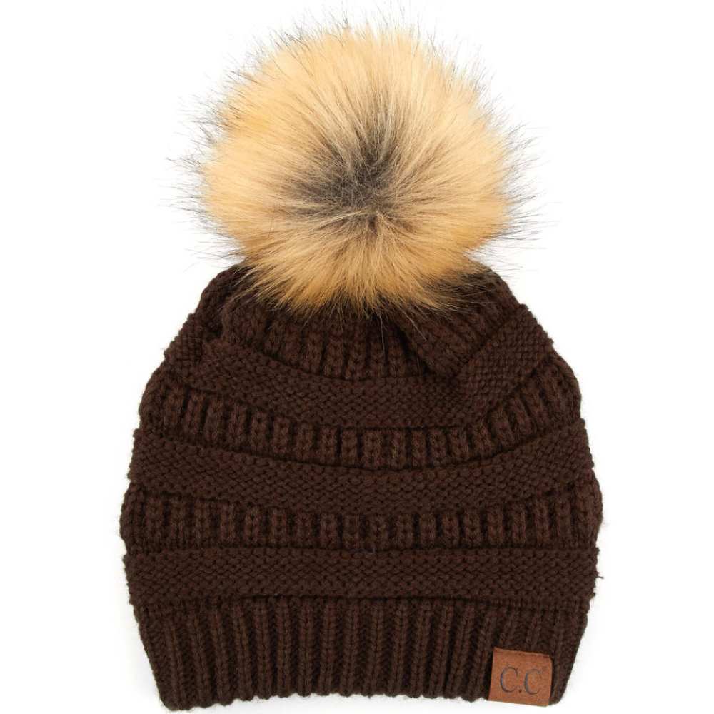 Brown Stay warm and cozy with this classic C.C Pom Pom Knit Beanie, crafted from 100% soft acrylic for all-day comfort. The ribbed knit design adds texture and durability, while the signature pom pom on top brings a playful touch to any winter outfit. One size fits most, making it the perfect accessory for everyone. Ideal for cold weather adventures or casual everyday wear.