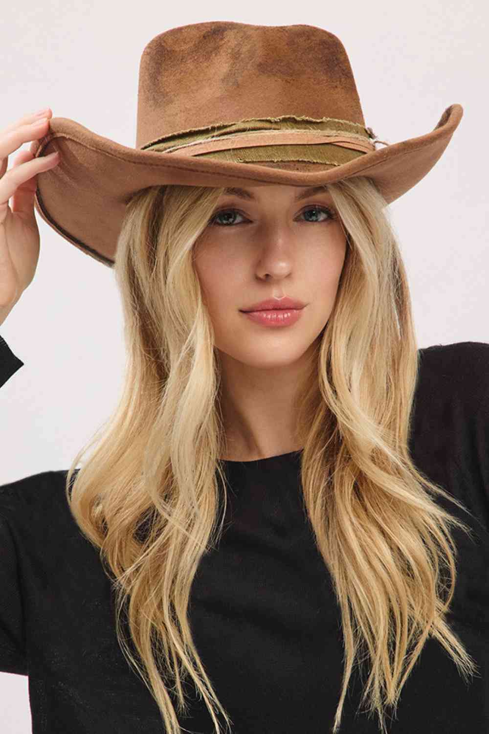 Brown Two iconic looks, one hat! This Cowboy Hat's flexible brim allows for effortless shaping, letting you wear it as a classic cowboy hat or style it as a contemporary fedora.