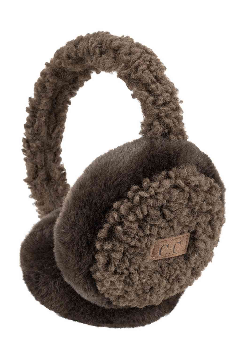 Brown C.C Faux Fur Sherpa Earmuffs. Stay warm and stylish with these. Crafted with quality faux fur and Sherpa on the inside for ultimate comfort, these earmuffs provide superior insulation and protection from the cold. Their classic and timeless design allows them to easily match with any outfit.&nbsp;