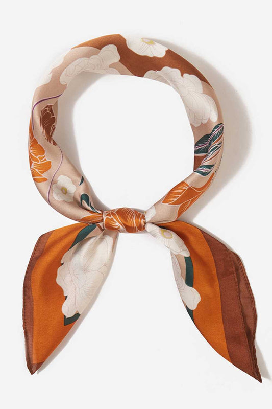 Brown Brighten your summer style with this charming floral pattern blocks bandana scarf. Crafted from lightweight 100% polyester, it's perfect for warm weather wear tie it around your neck, head, or wrist for effortless versatility. The generous 27.5" x 27.5" square cut offers plenty of styling options. Whether you're heading to the beach, running errands, or adding a pop of color to any outfit, this easy-care scarf keeps you cool and fashionable all season long.
