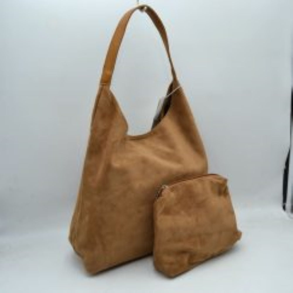 Brown This slouchy hobo bag features a clean, soft-textured exterior and a relaxed silhouette that makes it an excellent choice for everyday use. Designed with a wide, flat shoulder strap for comfortable carrying, the bag offers a spacious main compartment to easily organize and store larger essentials. Accompanied by a separate, matching inner pouch featuring a secure metallic zipper closure, this versatile set ensures smaller items stay safely tucked away.