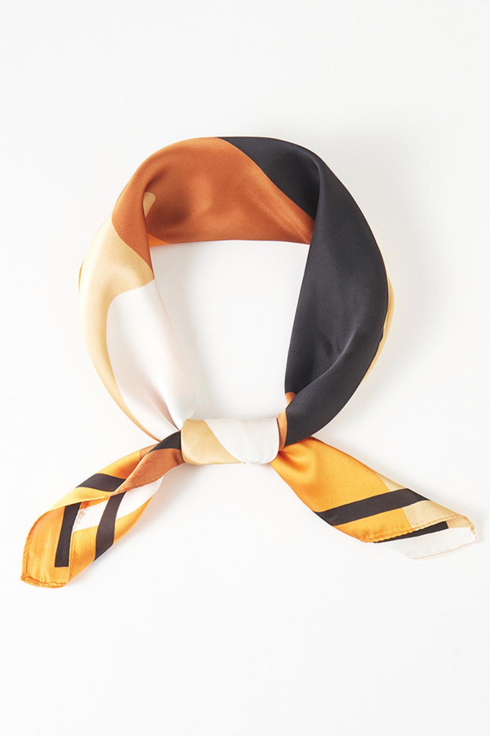 Brown Elevate your summer style with this versatile geometric pattern print bandana scarf. Crafted from lightweight 100% polyester, it's perfect for hot weather wear while maintaining breathability and comfort. The generous 27.5" x 27.5" square size offers endless styling possibilities wear it as a headscarf, neck wrap, or accessory to any outfit. Its vibrant geometric design adds a modern, eye-catching touch to casual or dressed-up looks. Ideal for travel, outdoor activities, or everyday wear, this durable