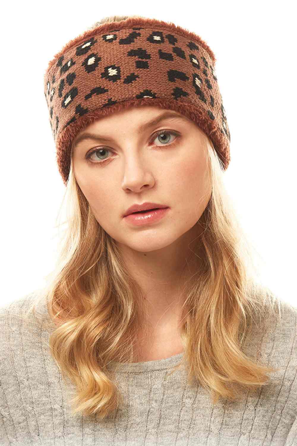 Brown Stay stylish with this eye-catching Leopard Print Headband. Crafted from a comfortable blend of 50% polyester and 50% acrylic, this versatile accessory measures 4" x 10" and fits one size. Perfect for keeping hair in place while adding a bold fashion statement to any outfit. Whether you're heading to the gym, running errands, or just want an instant style upgrade, this headband delivers both function and flair.