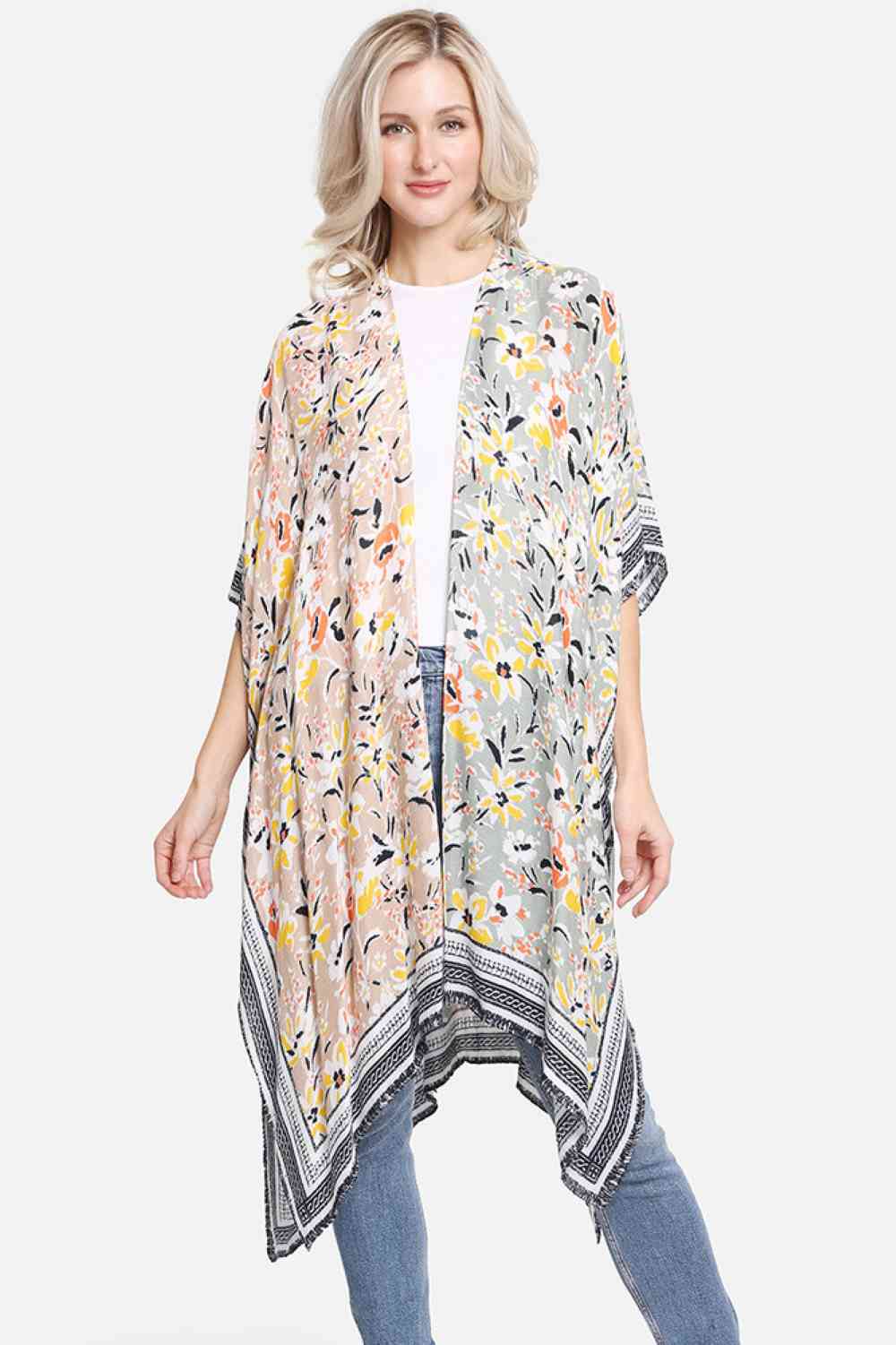 Brown Effortless summer style meets comfort in this vibrant multi-colored floral pattern cover-up. Crafted from 100% viscose, the lightweight fabric drapes beautifully while keeping you cool and comfortable. Perfect for beach days, poolside lounging, or casual outings, this versatile piece transitions seamlessly from day to night. Dimensions: 38" x 39". Made in China.
