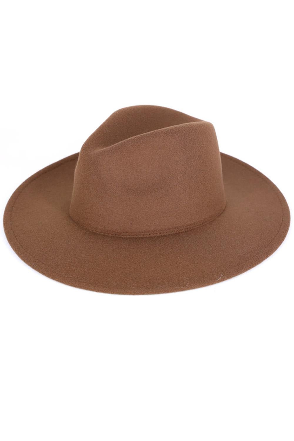 Brown Timeless style meets everyday comfort with this classic Solid Panama Hat. Crafted from durable 100% polyester, it offers a lightweight feel perfect for sun protection and casual wear. The 3" brim provides excellent shade coverage while maintaining that iconic panama silhouette. Whether you're heading to the beach, garden, or outdoor event, this versatile hat complements any warm-weather wardrobe. Easy to care for and built to last, it's an essential accessory for anyone seeking effortless elegance.