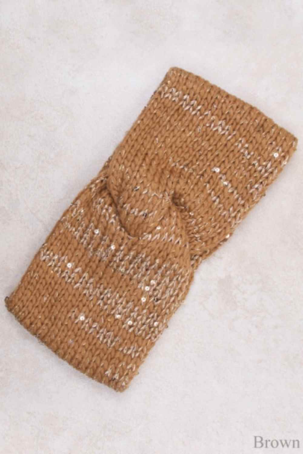 Brown Elevate your winter style with this charming two-color knit paired with a sparkling spangle headband. The soft, cozy knit features a classic color-block design, while the embellished headband adds a touch of glamour and personality. Perfect for staying warm without sacrificing style, this coordinated set brings effortless sophistication to any cold-weather look. Whether you're heading out for a casual day or a special occasion, this combination delivers comfort and eye-catching appeal.