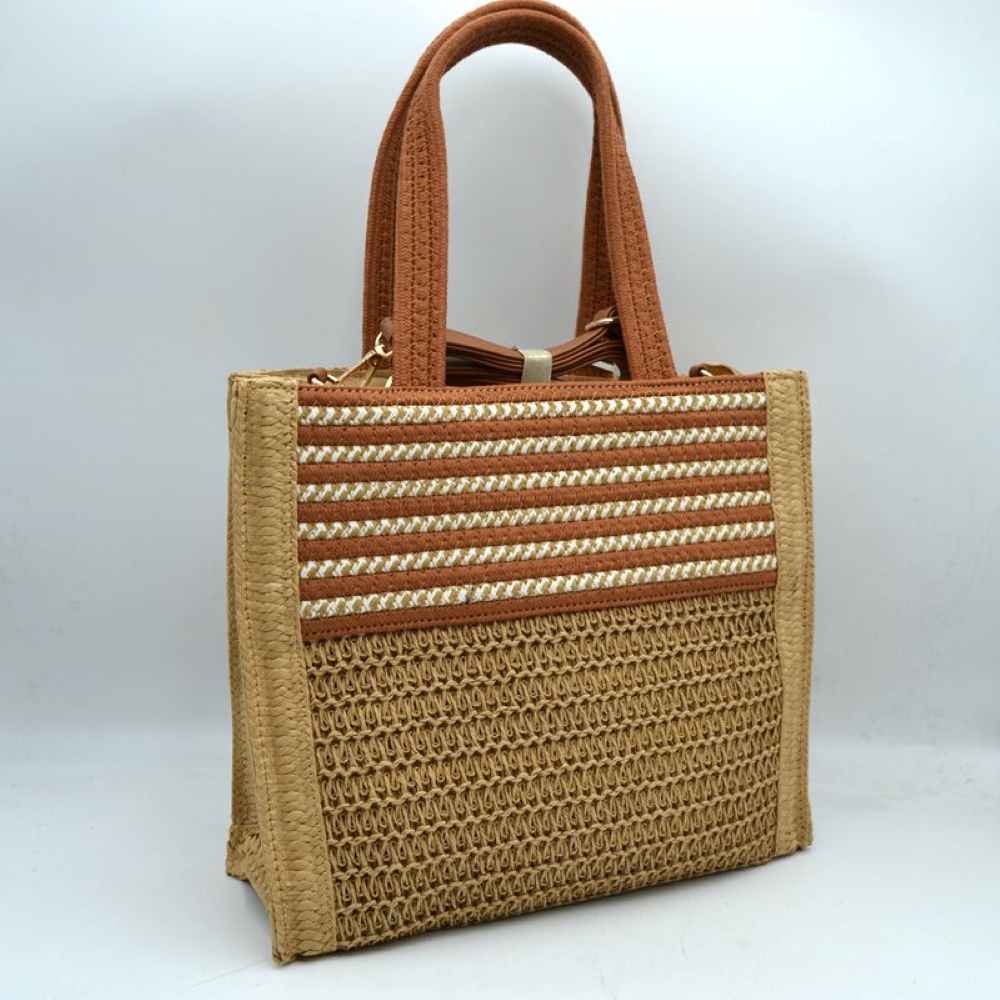 Brown Upgrade your warm-weather wardrobe with this beautifully detailed, structured woven straw tote bag. Perfectly capturing a laid-back, bohemian resort aesthetic, this spacious handbag is ideal for beach getaways, weekend markets, or adding an effortlessly chic touch to your everyday outfits.