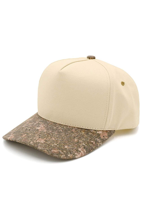 The C.C Two Tone Canvas Trucker Cap features a durable canvas front with breathable mesh backing for all-day comfort. Finished with a structured fit and adjustable snapback.