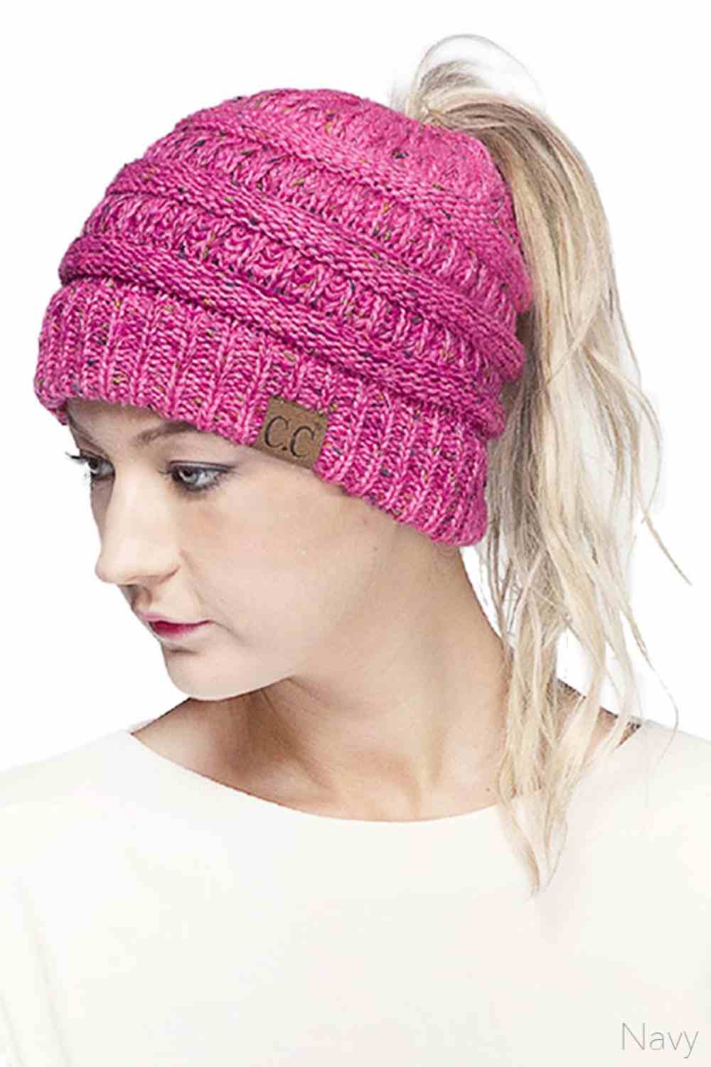Bubblegum Stay cozy and stylish with the C.C Ombre Confetti Messy Bun Ponytail Beanie. Crafted from 100% acrylic, this versatile beanie features a trendy messy bun opening that lets you wear your hair down while staying warm. The soft, stretchy fabric provides all-day comfort and durability, making it perfect for casual outings or outdoor adventures.&nbsp;