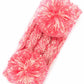 Pink Cozy two-tone kids head wrap featuring a soft fuzzy lining for extra warmth and comfort. Double pom-pom design adds playful style perfect for cold weather. Crafted from 100% acrylic for durability and easy care. One size fits most children. A practical accessory that keeps little ones warm while looking adorable.